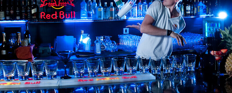 What are the benefits of employing flair bartenders?